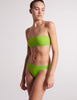 On model image of green bandeau top and green bottoms