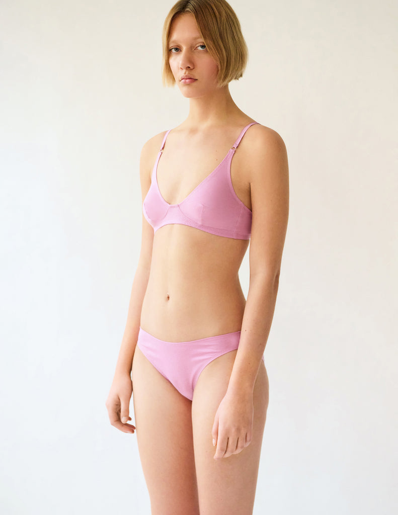 three quarter of woman wearing purple cotton bra and panty