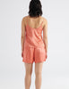 Back view of pink silk cami and matching pajama shorts.