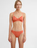 front view on model of woman in orange bra and thong